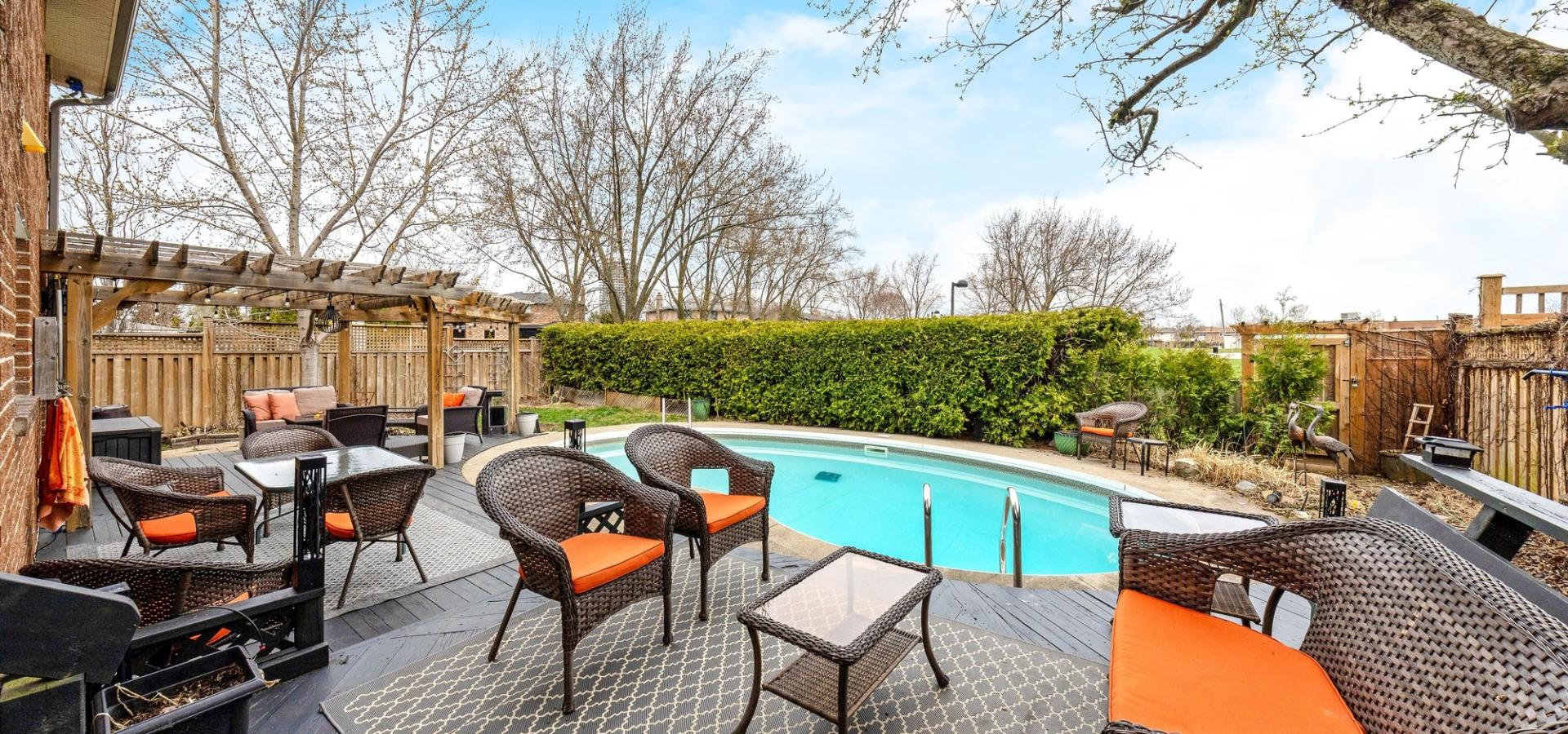Beautiful private backyard with inground pool backing onto greenspace