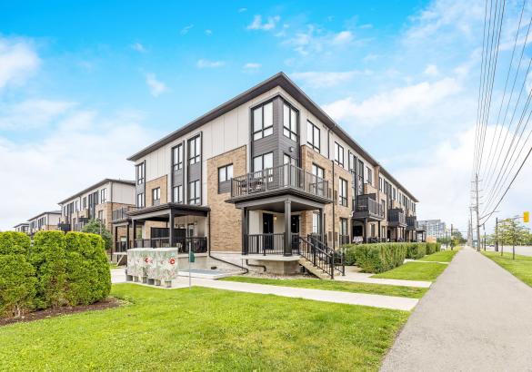 Modern brick and siding stacked townhouses