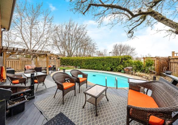 Beautiful private backyard with inground pool backing onto greenspace